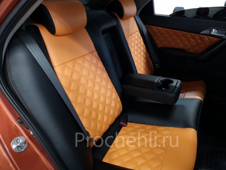 Каркасные авточехлы для Kia Cerato 2 из черной и оранжевой экокожи №2