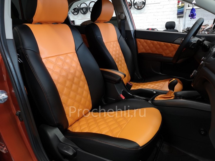 Каркасные авточехлы для Kia Cerato 2 из черной и оранжевой экокожи №7