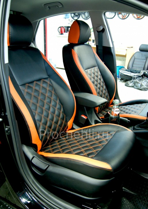 Каркасные авточехлы на Hyundai Solaris 2 из черной и оранжевой экокожи №1