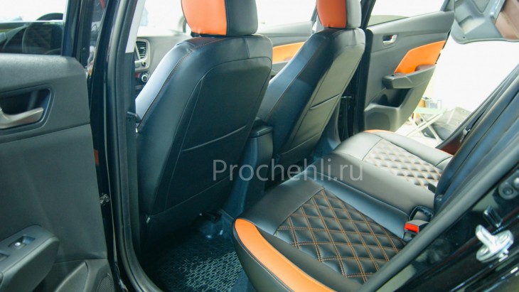 Каркасные авточехлы на Hyundai Solaris 2 из черной и оранжевой экокожи №4