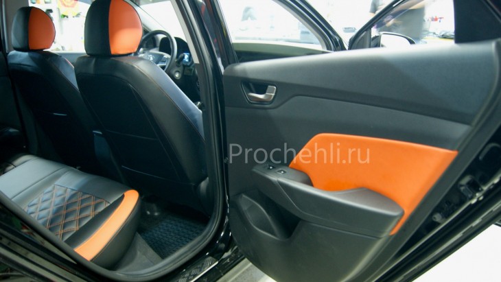 Каркасные авточехлы на Hyundai Solaris 2 из черной и оранжевой экокожи №5